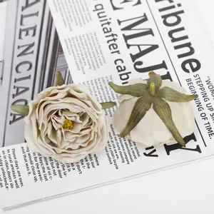 Artificial burnt-edge rose flower heads for wedding decoration, floral arrangement, and DIY crafts.