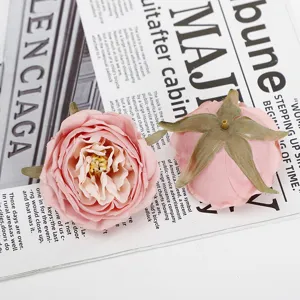 Pink artificial rose flower heads for wedding decoration, DIY floral crafts, and home decor.