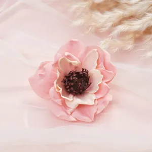 Silk artificial peony flower head detailed close-up shot pink floral decor ornament