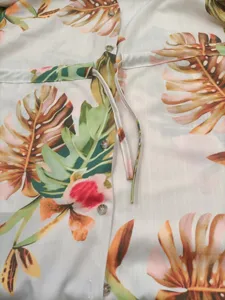 tropical leaf print dress detail close up button drawstring summer beachwear fashion