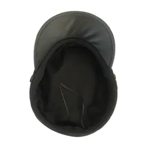 Detail view of the black cadet cap interior, showing the lining and structured front visor.