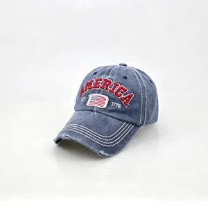 Detailed view of vintage washed distressed blue baseball cap with America embroidery patch.