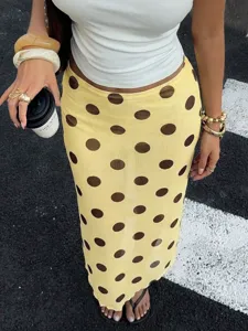 Chic yellow polka dot mesh midi skirt, double layered stylish streetwear for women summer 2026.