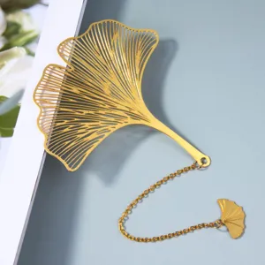 Golden hollow ginkgo leaf bookmark detail, elegant metal page marker with chain pendant.