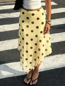 Chic polka dot mesh asymmetrical midi skirt with double layer draping design for women.