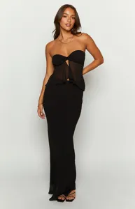 Close-up view of black mesh splicing tube top and drape maxi skirt set detail showcase.