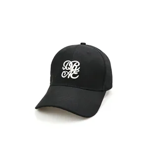 Detailed close-up view of the black cotton baseball cap featuring white 3D embroidery.