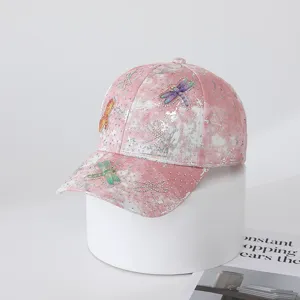 Pink rhinestone dragonfly tie-dye baseball cap, stylish accessory for outdoor casual wear.