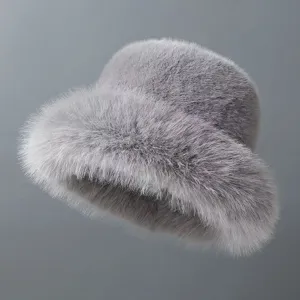 Cozy faux fur winter bucket hat for women, plush warm fuzzy basin hat in stylish gray color.