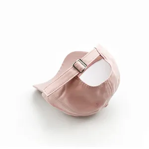 Pink cotton baseball cap back view detail, adjustable metal buckle strap, soft top casual hat.