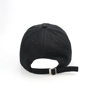 Rear view detail of a classic black cotton baseball cap with adjustable metal buckle strap.