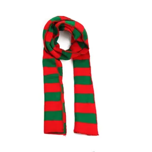 Red and green striped knitted scarf detail shot, cozy winter holiday accessory texture.