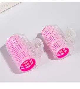 Plastic air bangs hair rollers with clips, pink hair curler cylinders for daily styling.