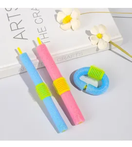 Close-up of soft foam hair curlers, blue and pink rollers for easy and comfortable overnight styling.