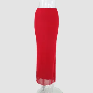 Detail view of the elegant red mesh double-layer maxi skirt showing soft draped texture.