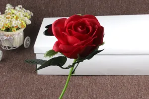 Detailed view of single red soap rose artificial flower, ideal for wedding and home decor.