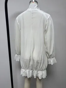 White crystal velvet mini dress with stand collar, flare long sleeves, and ruffle hem.