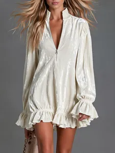 Detail view of crushed velvet mini dress with zip stand collar and ruffled long sleeves.