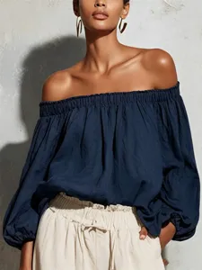 Detailed view of the dark blue off-the-shoulder long lantern sleeve casual cotton linen top.