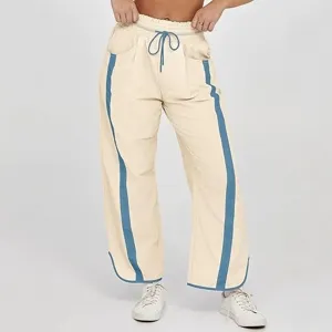 Casual losse dames joggingbroek met koord en contrasterende zijstrepen comfortabel chic.