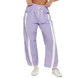 Vrouwen casual losse trekkoord emmer broek met witte zijstrepen paarse sportkleding