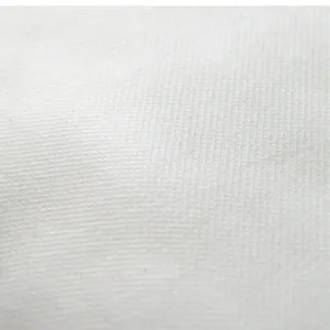 Weißer Vliesstoff Kissenfüllung Textur Nahaufnahme, weich langlebiges Heimtextil Füllmaterial.