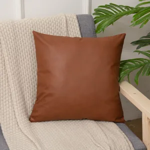 Brown faux leather throw pillow cover for modern sofa and home decor detail view