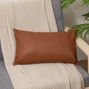 Brown faux leather throw pillow cover for sofa and bed, elegant decorative lumbar cushion.