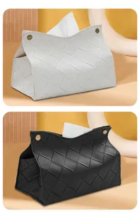 Modern minimalist woven leather tissue box for home desktop decoration and daily use.