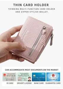 Close-up detail of pink leather card holder wallet showing smooth zipper and multi slots.
