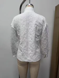 White stand collar long sleeve top with floral texture showcasing detailed back view.