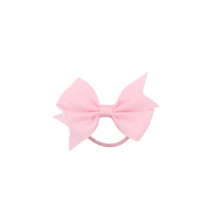 Détail élastique cheveux nœud ruban rose, accessoire cheveux nœud gros-grain pour filles.