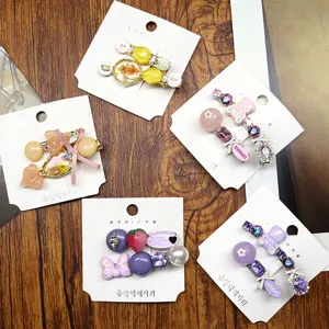 Cute sweet bear rhinestone duckbill hair clips set, Korean style side bangs clips detail view.