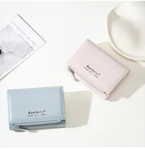 Minimalist women tri-fold short wallet with zipper coin pocket and multiple card slots design.