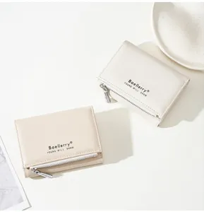 Mini trifold women wallet with zipper coin pocket, compact PU leather card holder chic style.