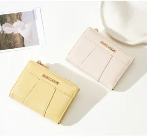Stylish minimalist PU short women wallet with multiple card slots and zipper coin pocket.