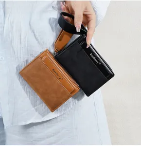 Detail view of women short colorblock wallet zipper coin purse with card slots wrist strap