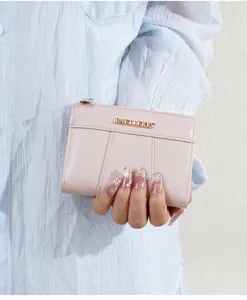 Pink PU short women's wallet with multi-card slots zipper design and metal logo.