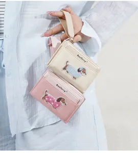 Detailed view of a cute cartoon dachshund short wallet with zipper and wrist strap.