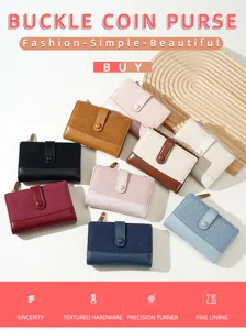Close-up detail of stylish short coin purse with buckle closure and mixed textured finish.