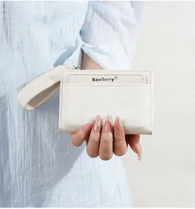 Close-up of a stylish women short wallet card holder with wrist strap and zipper design.