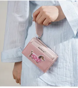 Pink short zipper wallet card holder with cute dachshund embroidery and wrist strap for women.