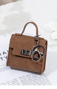 Mini brauner Taschenanhänger Schlüsselanhänger Retro Münzbörse für Autoschlüssel und Kopfhörer