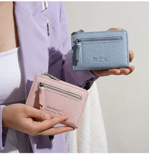 Detail view of mini soft leather zipper coin purse and short wallet in pink and blue.