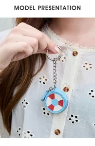 Mini llavero redondo de cuero con diseño de salvavidas y cremallera metálica para monedas.