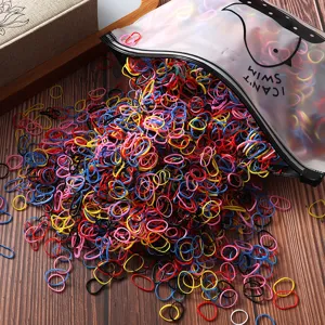 Colorful disposable rubber hair ties detail shot, high elastic small hair bands for girls styling.