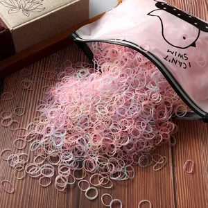 Detailed shot of colorful disposable hair rubber bands for girls, elastic hair ties.