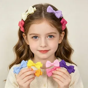 Colorful fabric bow hair clips for baby girls, handmade non-slip hairpins set for toddlers.