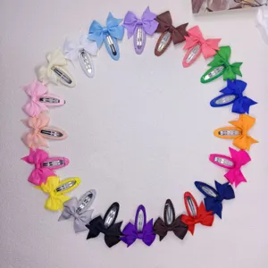 Colorful fabric bow hair clips detailed view, cute pastoral style hair accessories for kids.