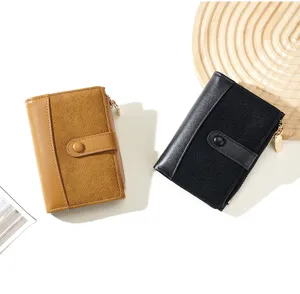 Compact women short wallet with color block design, snap closure and zipper pocket style.
